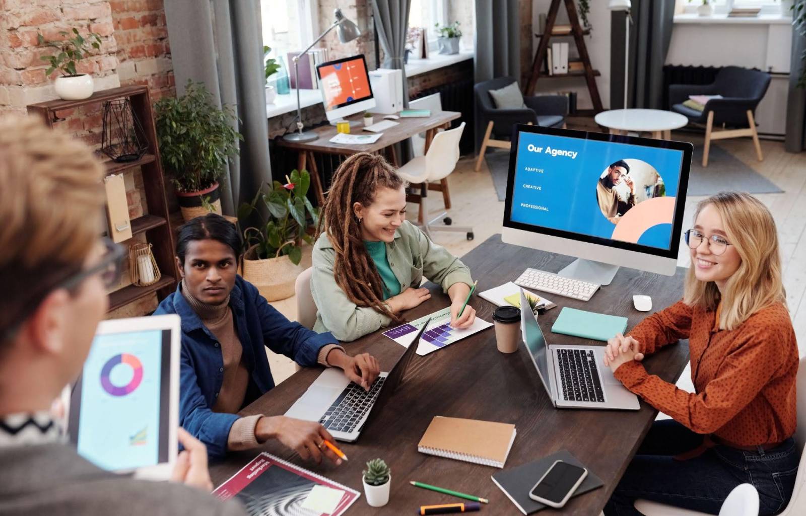 Business professionals discussing enterprise lead generation with a lead generation agency