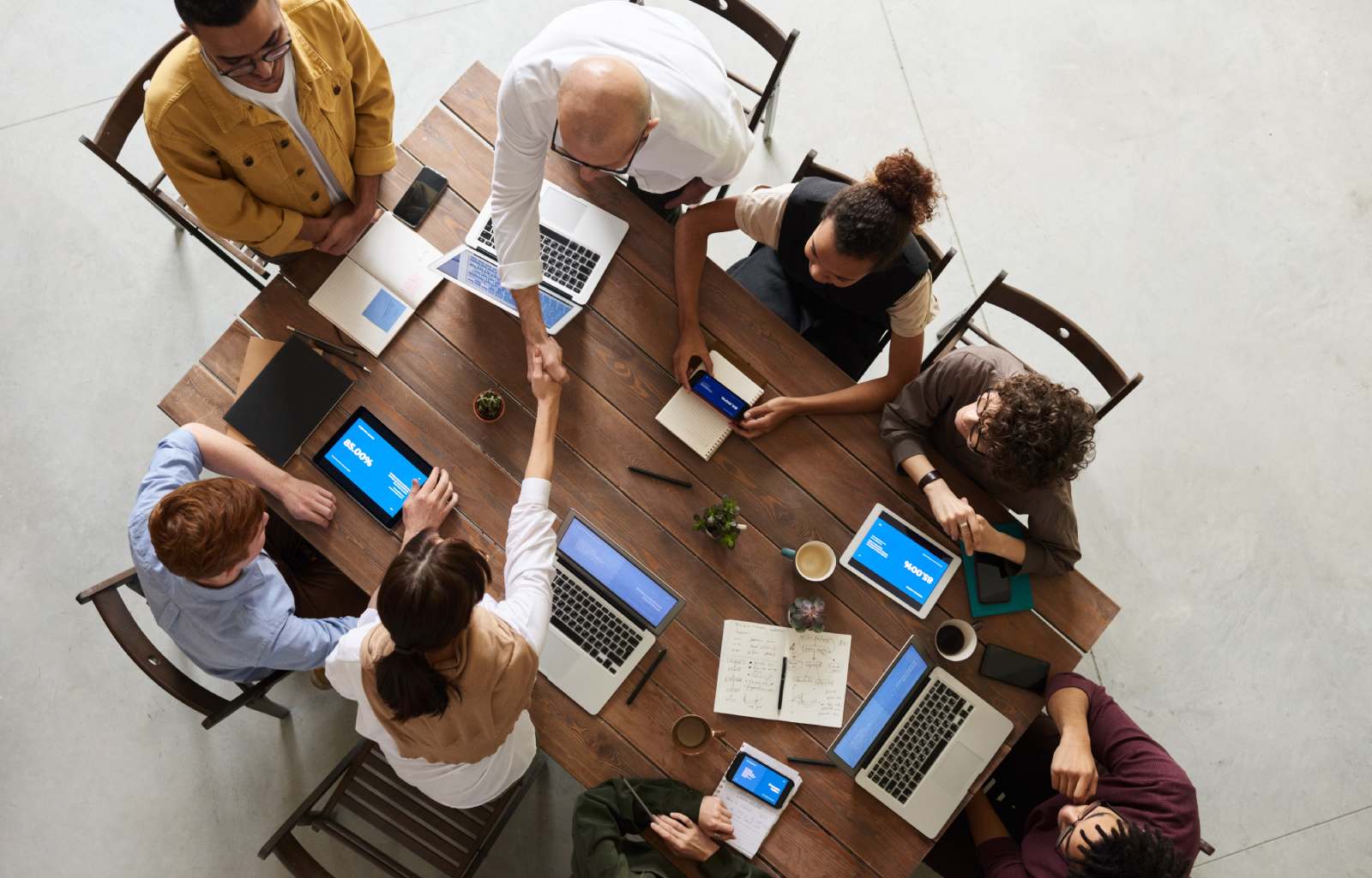 A B2B sales team analyzing data on a laptop, representing strategies used by top lead generation companies in Dubai.